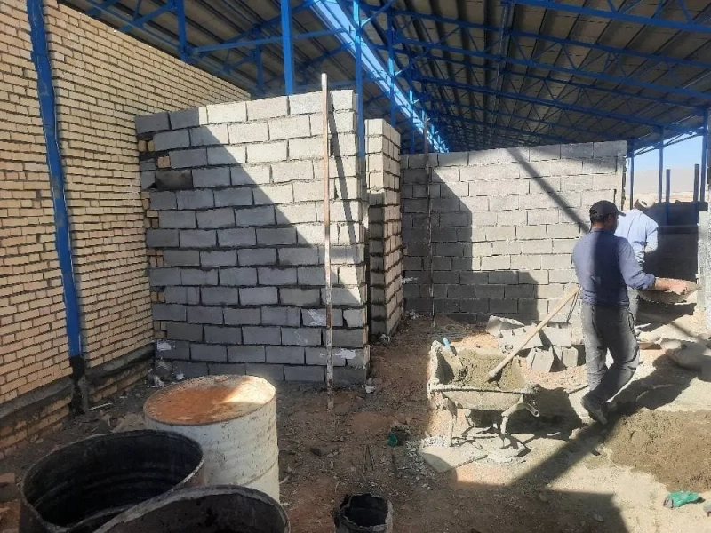 عملیات بهسازی و ارتقای نمای سالن جمع‌ آوری شیر در پروژه 6000 رأسی ملایر